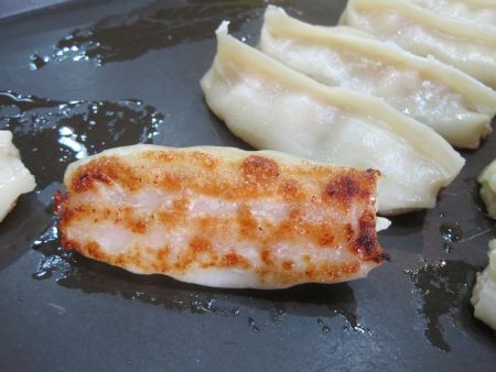 Pan fry both end open potstickers until they turn golden and crispy